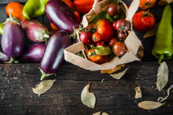 fresh-organic-vegetables-on-wooden-table-NFYGQZE.jpg